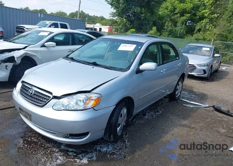 2005 Toyota Corolla Le z USA, uszkodzony, nr VIN JTDBR32E552053684